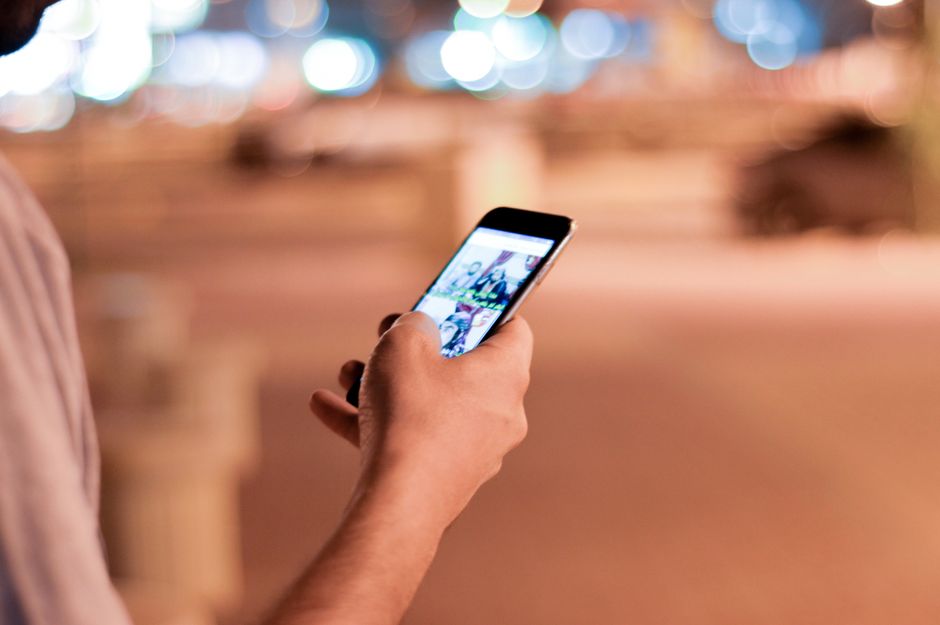smartphone scrolling night