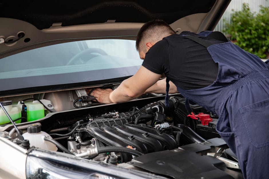 mechanic working car